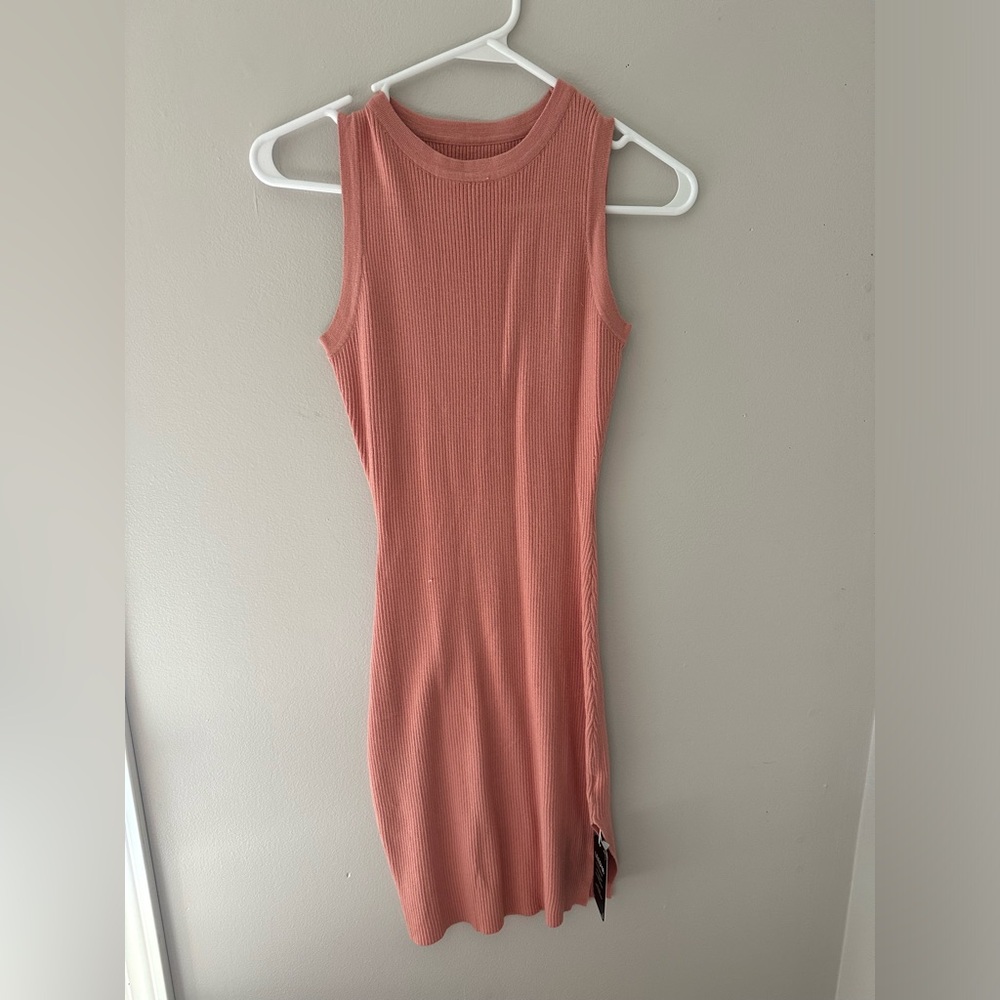 never worn, still has tags